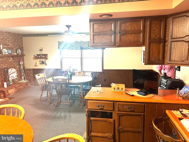 kitchen featuring carpet floors and ceiling fan