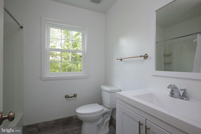 full bathroom with vanity, a healthy amount of sunlight, toilet, and shower / bath combination with curtain