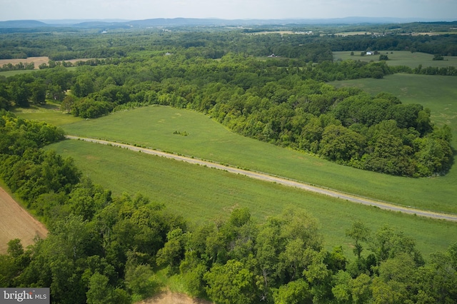 birds eye view of property featuring a rural view