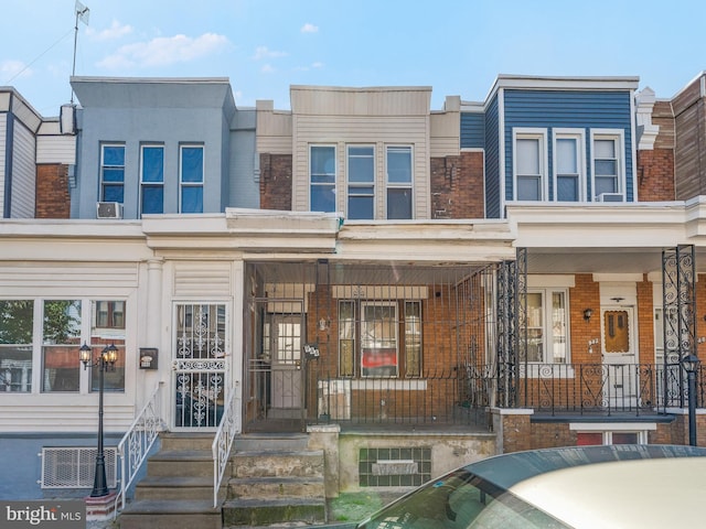 multi unit property featuring covered porch