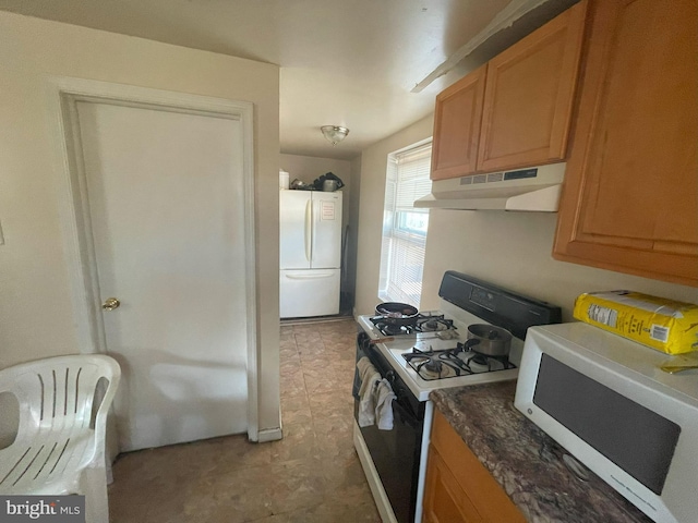 kitchen featuring white appliances