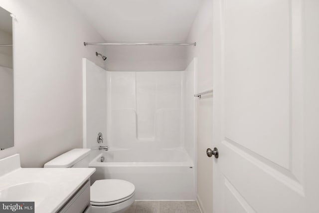 full bathroom featuring tile floors, toilet, vanity, and bathing tub / shower combination