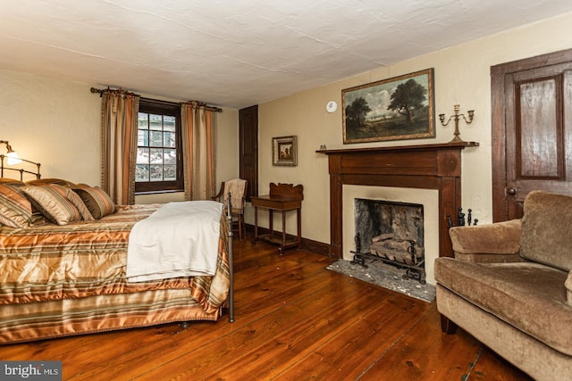 bedroom featuring dark wood-type flooring