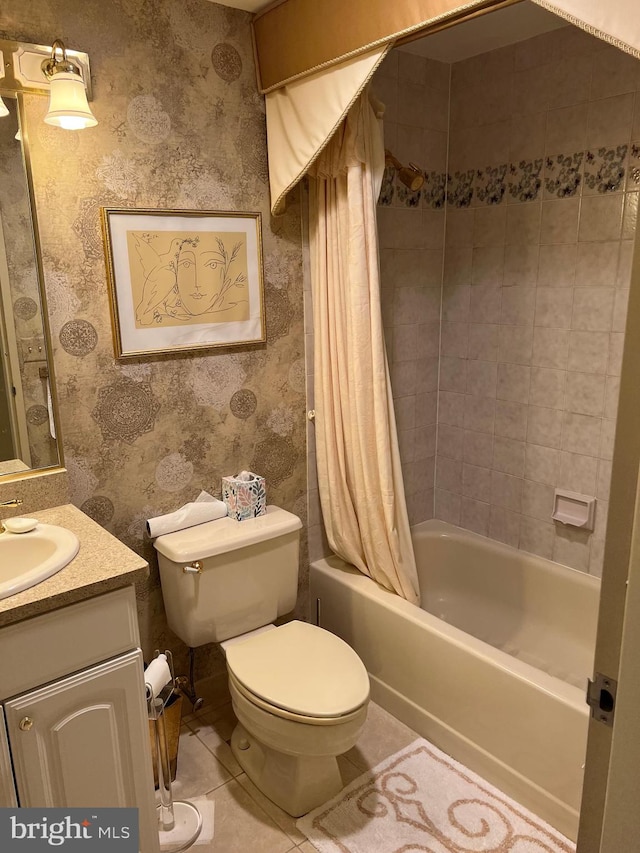 full bathroom featuring shower / tub combo with curtain, tile patterned flooring, vanity, and toilet