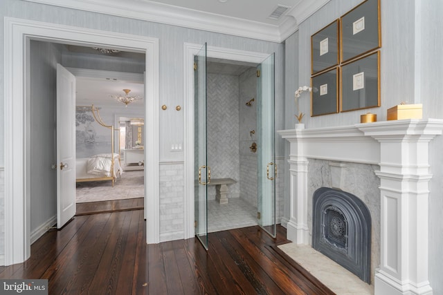 living room featuring crown molding and dark hardwood / wood-style floors