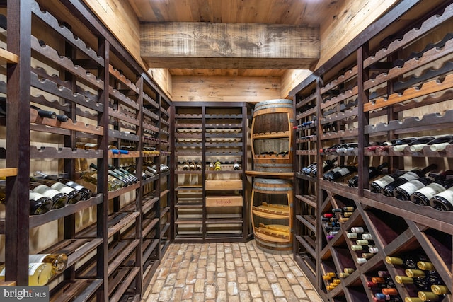 wine cellar with wooden ceiling