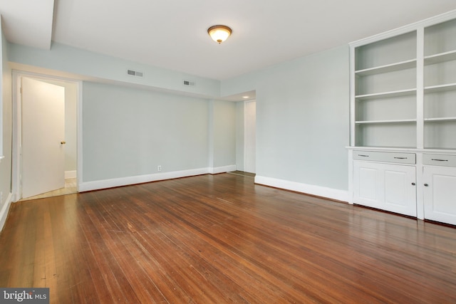 interior space with dark hardwood / wood-style floors