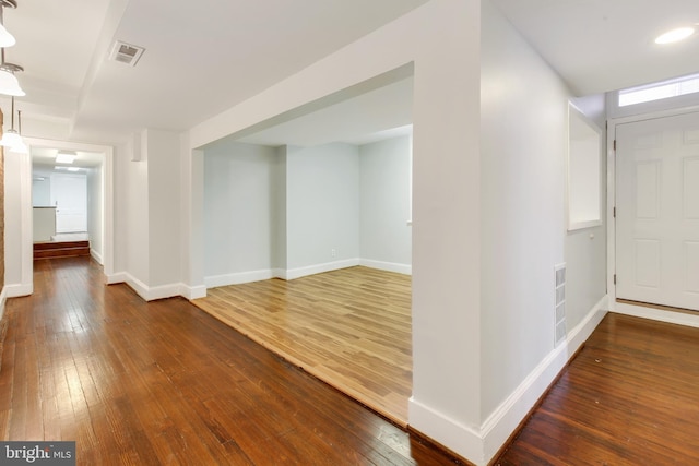 empty room featuring dark hardwood / wood-style floors