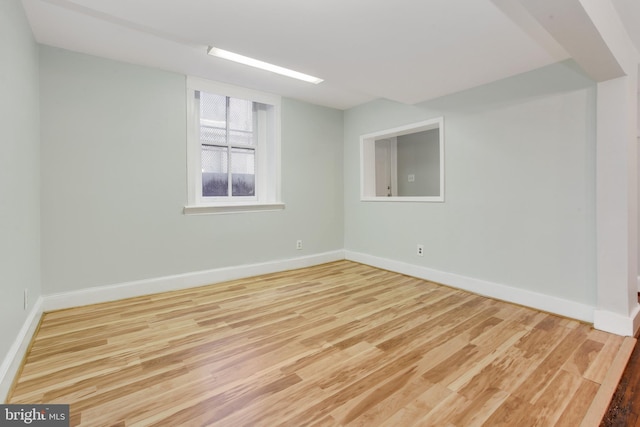 empty room with light wood-type flooring