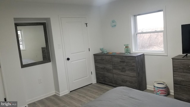 bedroom featuring light hardwood / wood-style floors