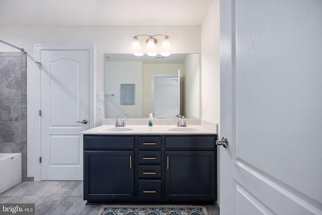 bathroom with vanity, tile patterned floors, and separate shower and tub