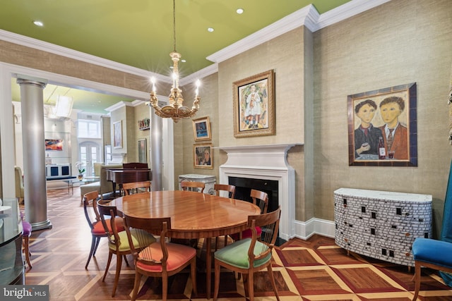 dining area with an inviting chandelier, ornamental molding, decorative columns, and dark parquet flooring