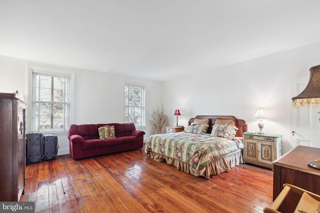 bedroom featuring dark wood-type flooring