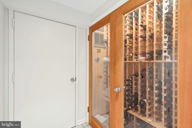 wine cellar featuring tile floors