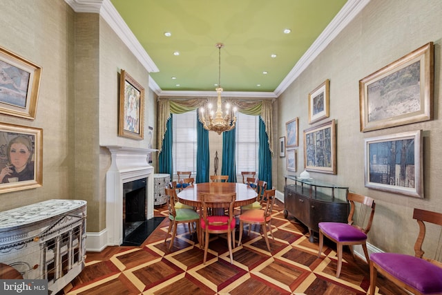 dining room with crown molding, dark parquet flooring, and an inviting chandelier