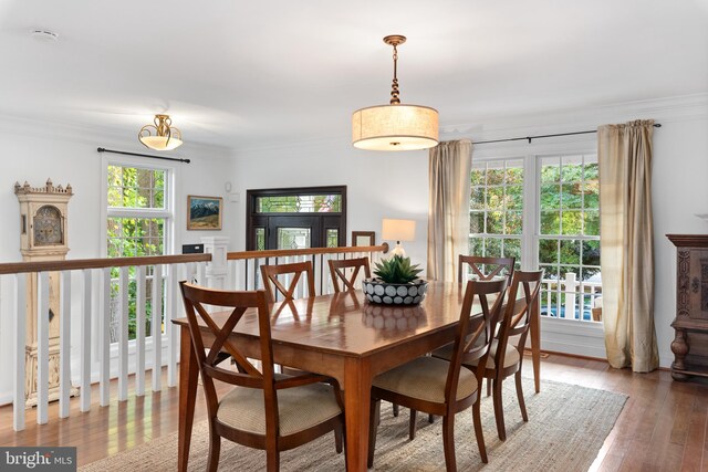 164 W Lake Dr, Annapolis, MD 21403 - dining room featuring crown molding and light hardwood / wood-style floors