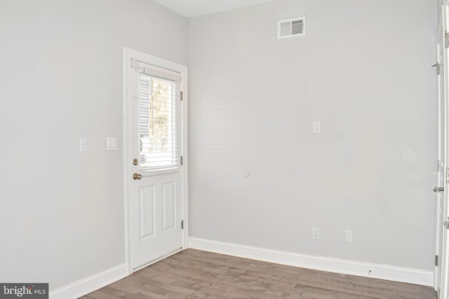 empty room featuring dark hardwood / wood-style floors