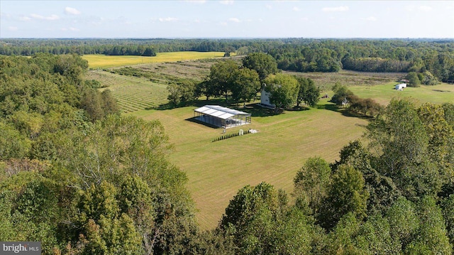 birds eye view of property with a rural view