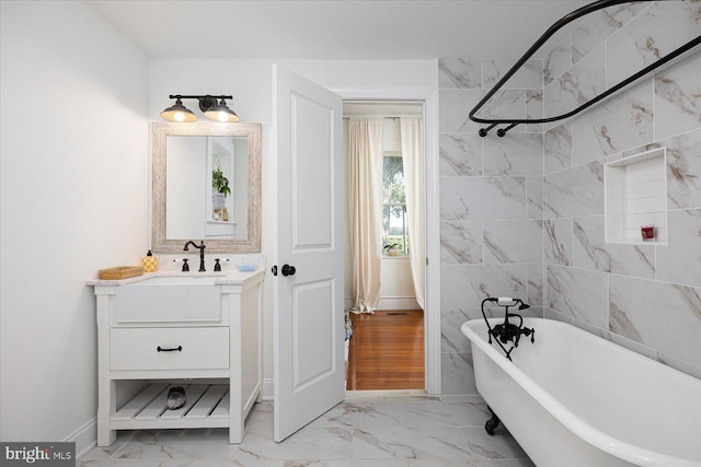 bathroom featuring a bathtub and vanity