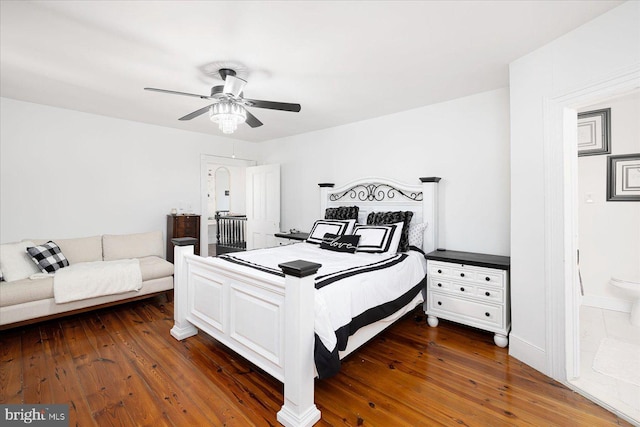 bedroom with ceiling fan and dark wood-type flooring