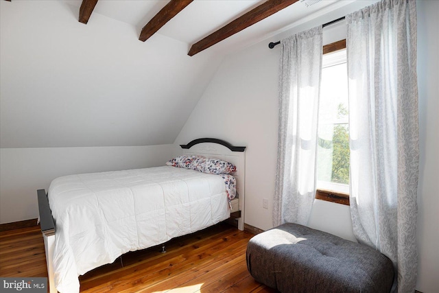 bedroom with vaulted ceiling with beams and dark hardwood / wood-style flooring