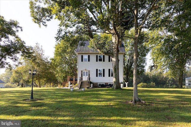 view of front of house with a front yard