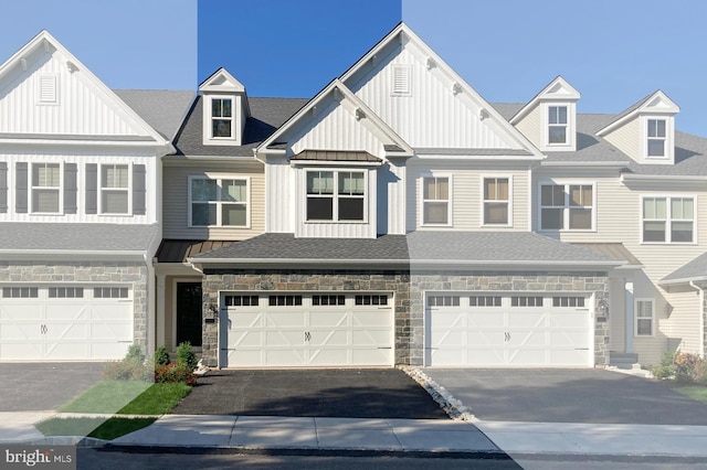 townhome / multi-family property featuring a garage