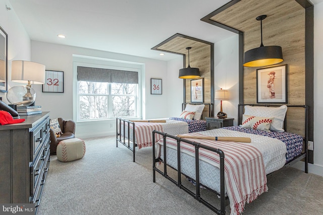 bedroom featuring carpet and wooden walls