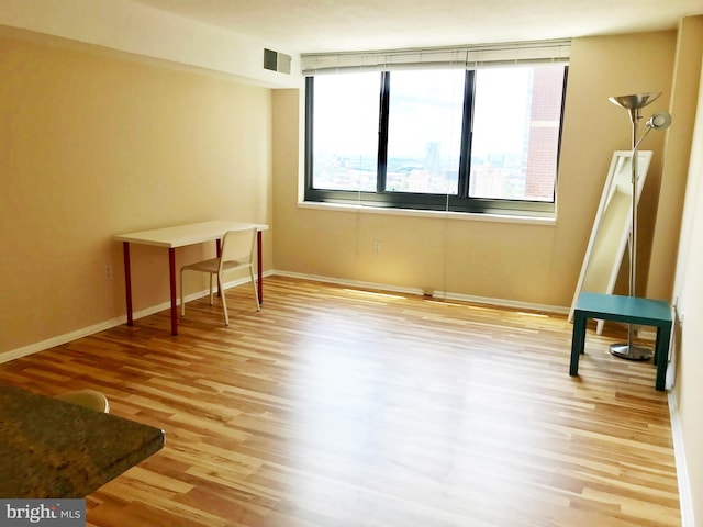 empty room with light wood-type flooring