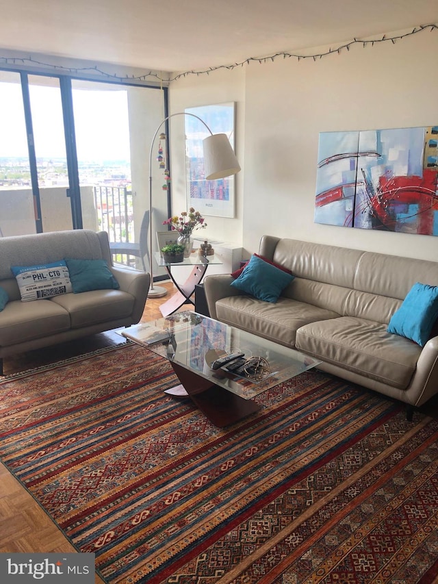 living room with parquet flooring