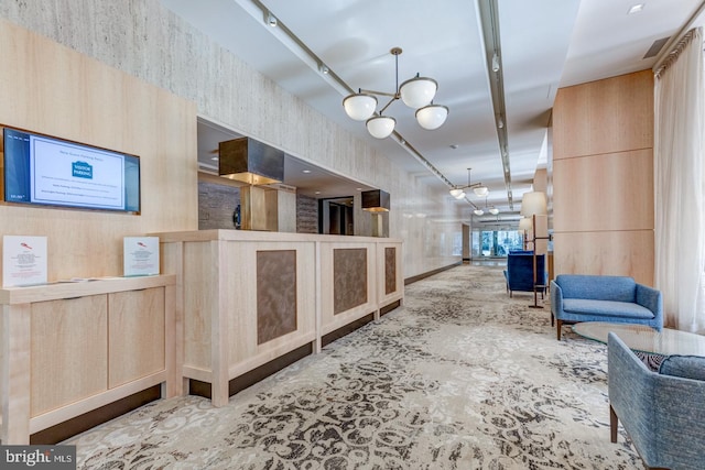 reception area with a notable chandelier