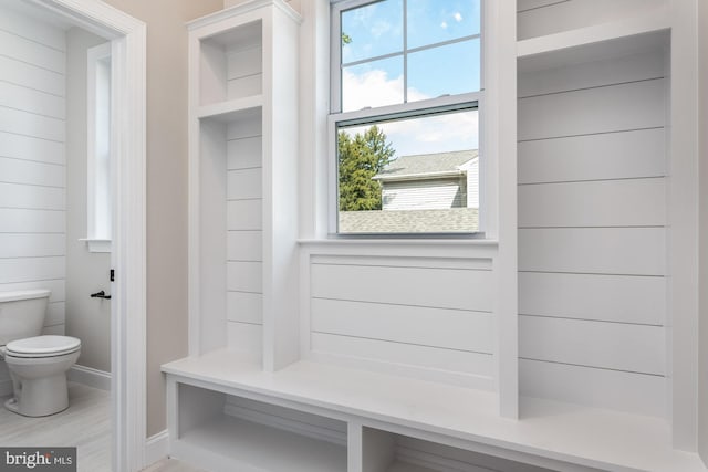 mudroom with hardwood / wood-style floors