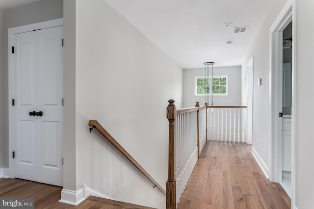 hall featuring hardwood / wood-style flooring