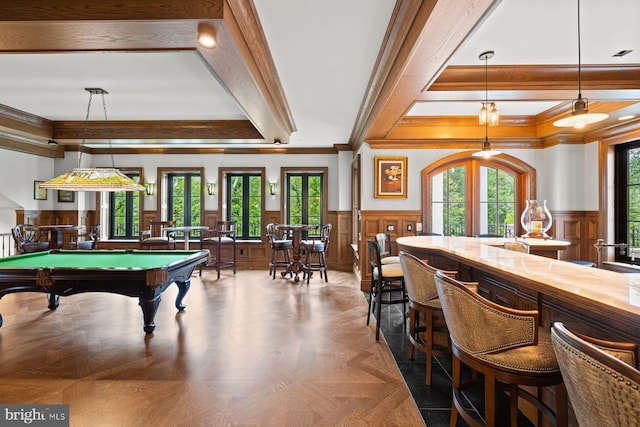 game room featuring parquet flooring, beamed ceiling, a healthy amount of sunlight, and pool table