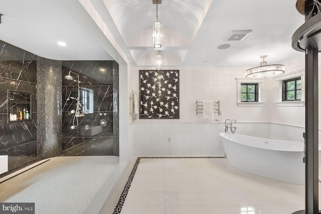 bathroom featuring separate shower and tub, tile patterned flooring, and tile walls