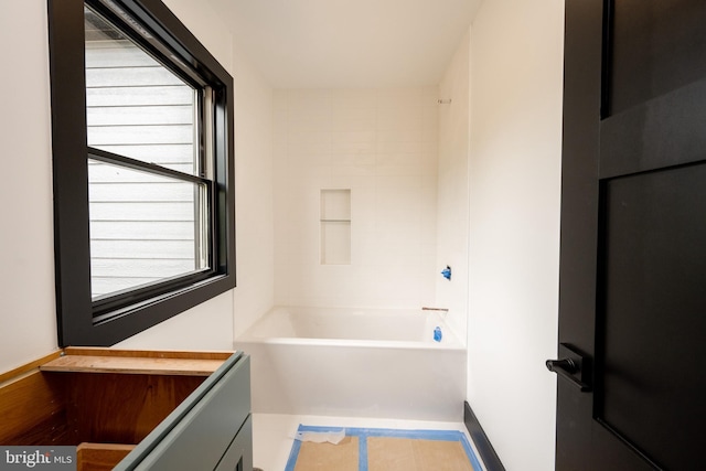 bathroom featuring  shower combination