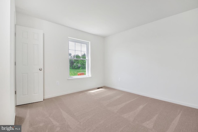 empty room with light carpet