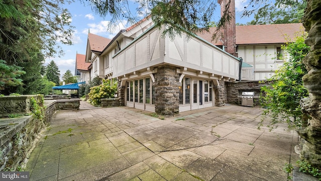 1717 Woodland Rd, Abington, PA 19001 - exterior space with french doors and a patio