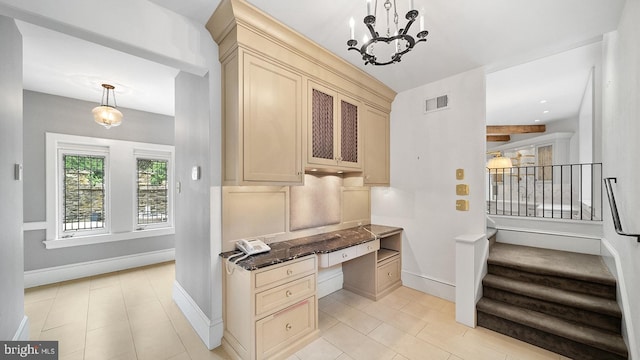1717 Woodland Rd, Abington, PA 19001 - interior space with light tile flooring, built in desk, and a chandelier