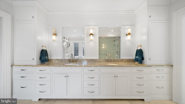 1717 Woodland Rd, Abington, PA 19001 - bathroom with walk in shower, ornamental molding, double sink, and vanity with extensive cabinet space