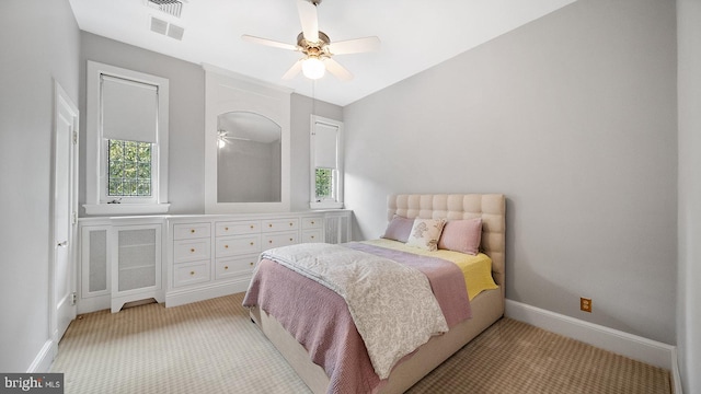 1717 Woodland Rd, Abington, PA 19001 - bedroom featuring multiple windows, ceiling fan, and light colored carpet