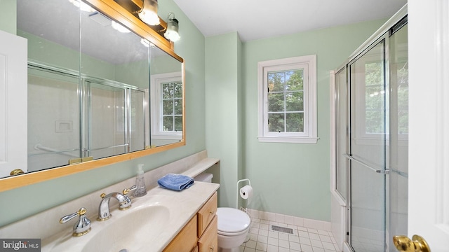 1717 Woodland Rd, Abington, PA 19001 - bathroom featuring a shower with shower door, tile flooring, toilet, and vanity