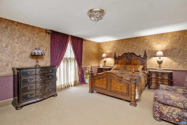 bedroom with light colored carpet