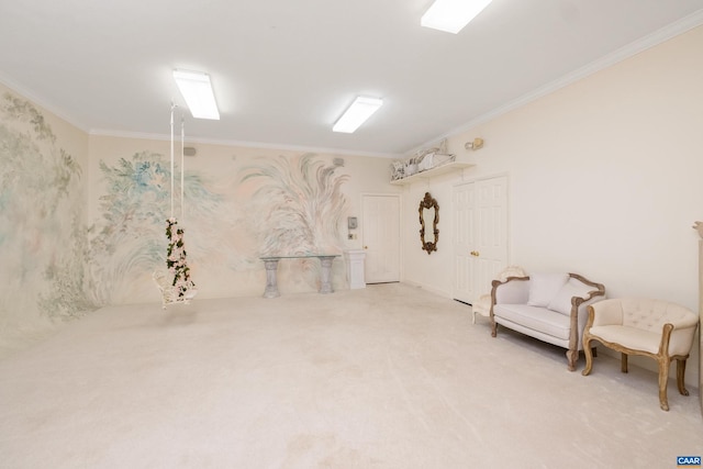 sitting room with crown molding and light colored carpet