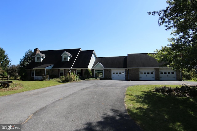 new england style home with a front yard