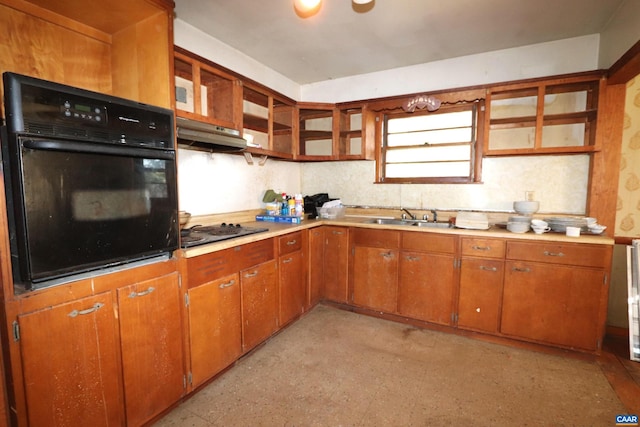 kitchen featuring sink and black appliances