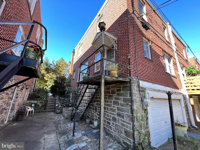 view of home's exterior featuring a garage