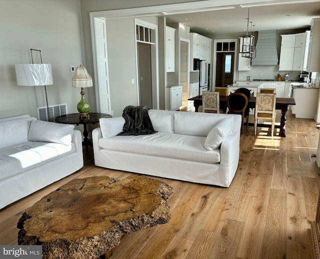 994 Valley Crossing Dr, Lititz, PA 17543 - living room featuring visible vents and light wood-style flooring