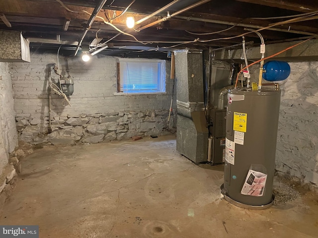 basement featuring heating utilities and electric water heater