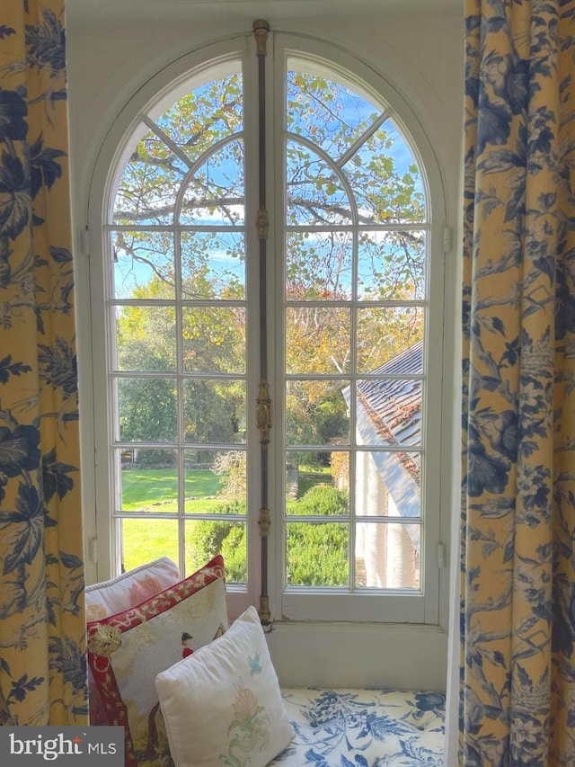 bedroom with multiple windows